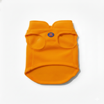 Orange dog sweater with a brand logo on a white background