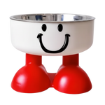 Pet bowl with smiley face design on a white background