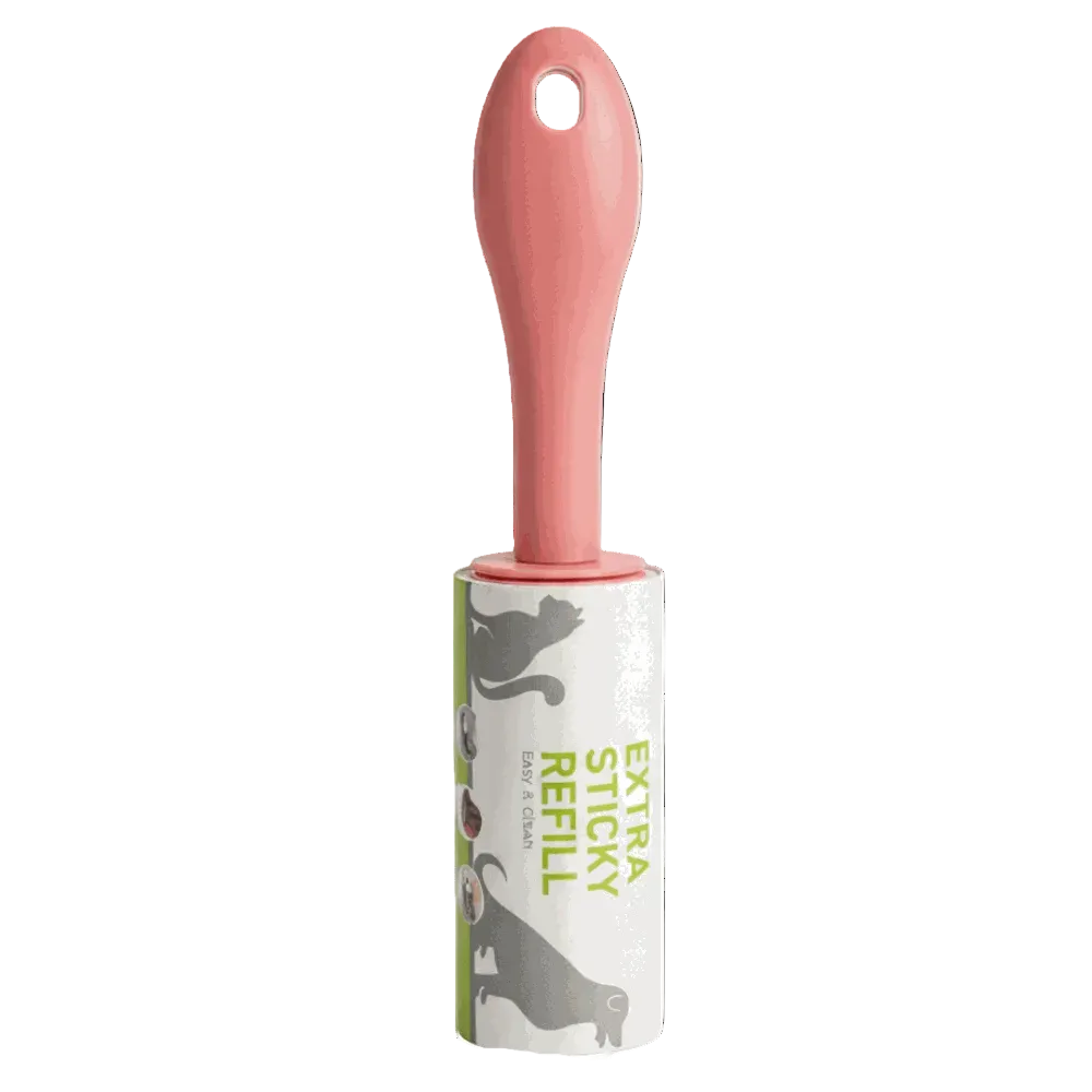 Pet grooming tool with pink handle and white refill cartridge on a white background