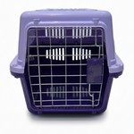 Purple pet carrier with a wire mesh door on a white background