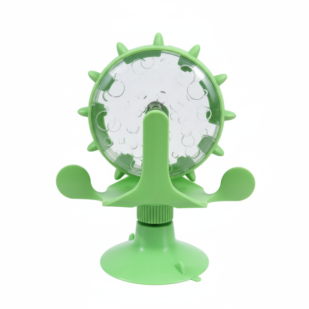 Green pet toy with a transparent center on a white background