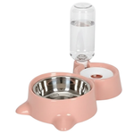 Pink pet feeder and water bottle set on a white background