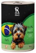 Dog food can with a label featuring a dog and text on a green and black background