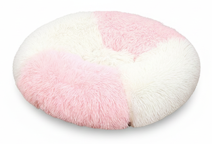 Round pink and white fluffy cushion on a white background