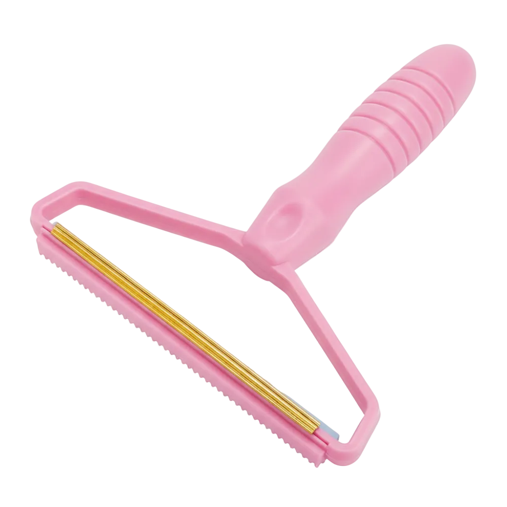 Pink pet grooming brush with gold bristles on a white background