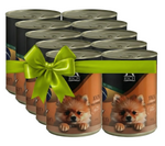 Multiple cans of pet food with a green bow on a white background
