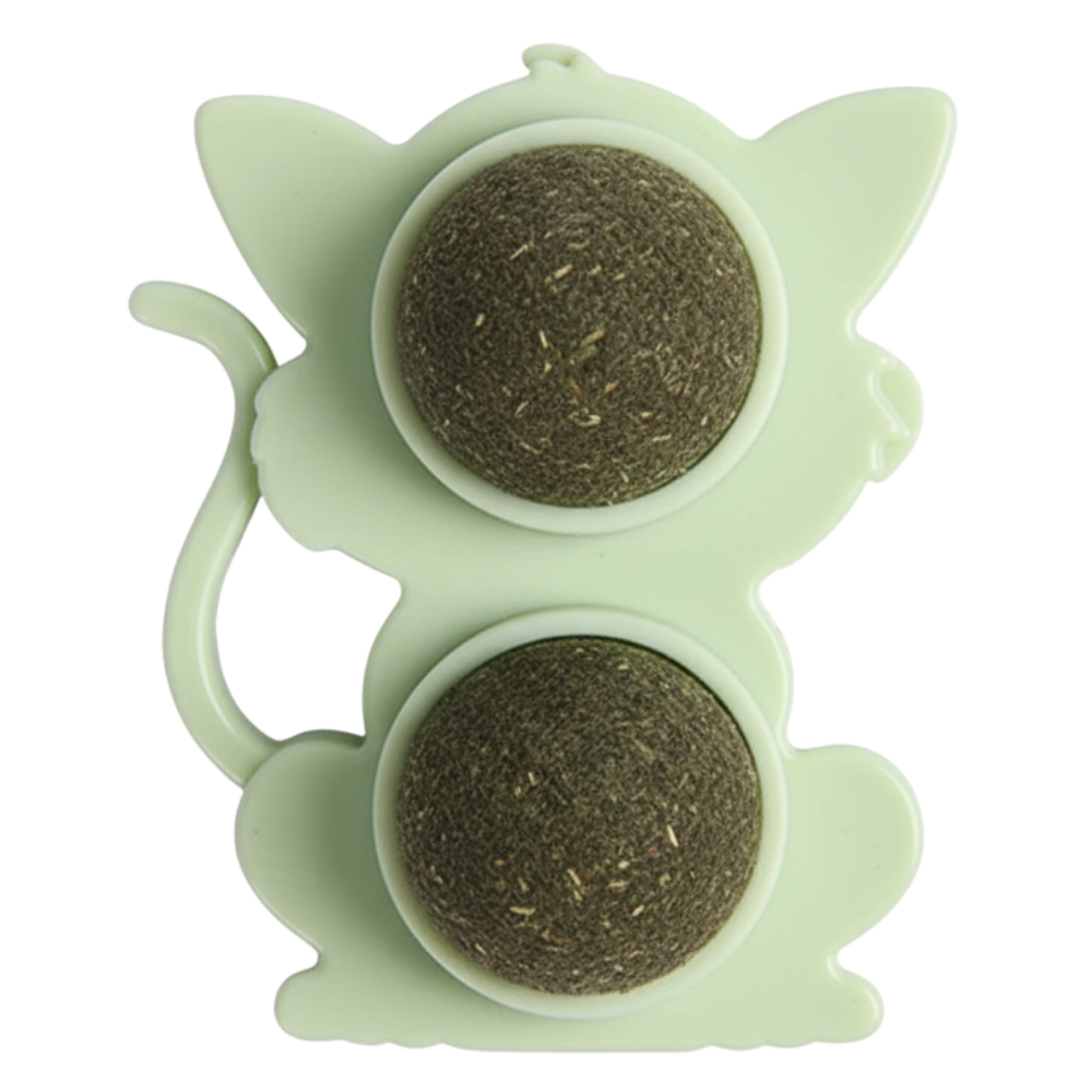 Green silicone tea infuser with two compartments on a white background