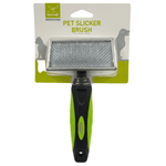 Pet slicker brush with green handle on a white background