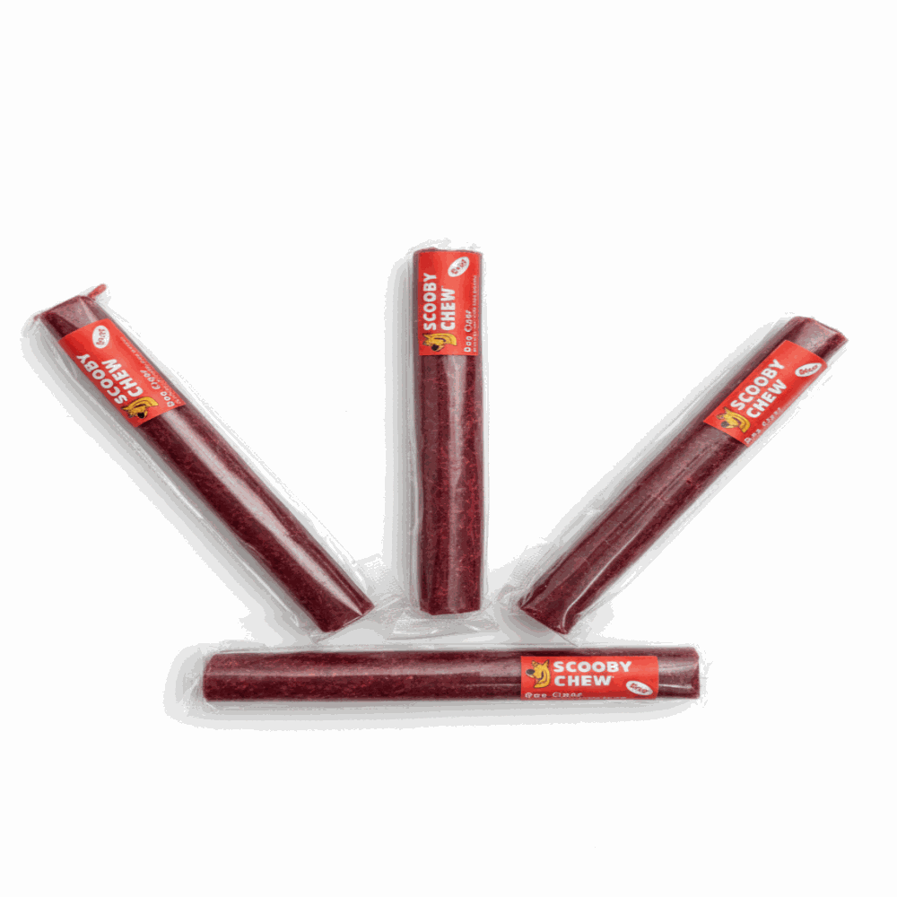 Four packages of Scooby Chew on a white background
