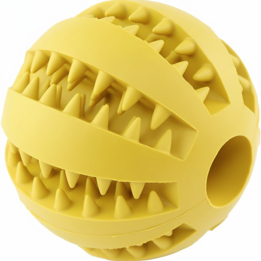 Yellow rubber ball with textured surface and hole on a white background