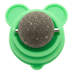 Green pet toy with a textured ball on a white background