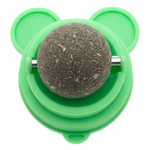 Green pet toy with a textured ball on a white background