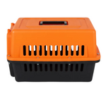 Orange and black pet carrier on a white background