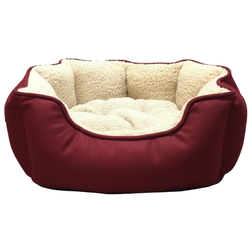 Red pet bed with beige interior on a light gray background