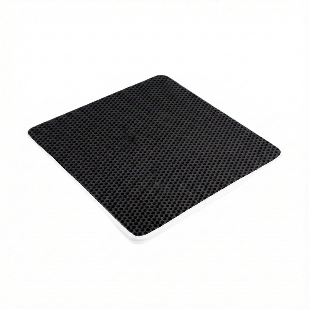 Black mouse pad with textured surface on a white background