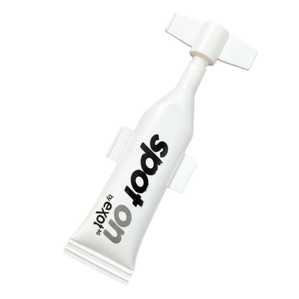 White tube with black text on a white background