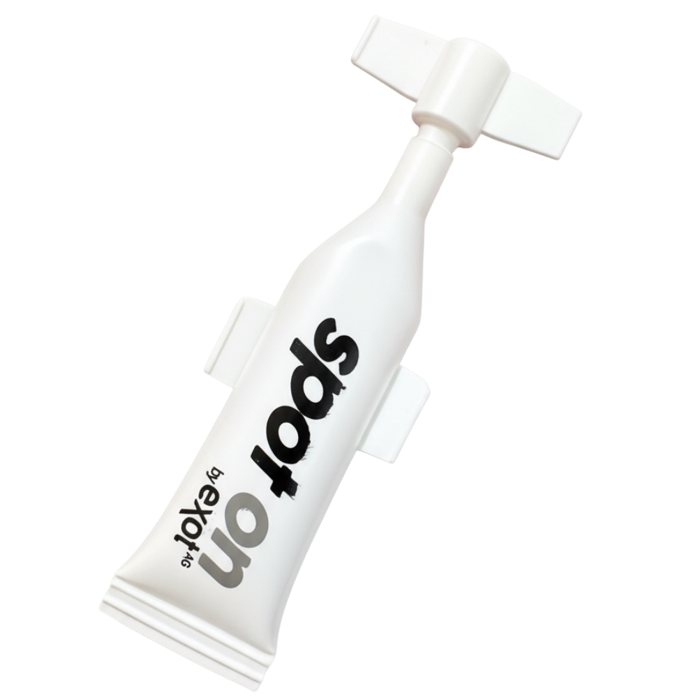White tube with black text on a white background
