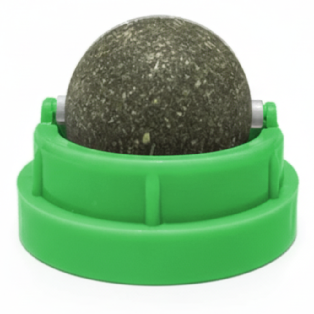 Green plastic container with a textured ball inside on a white background