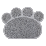 Gray paw-shaped sponge on a white background