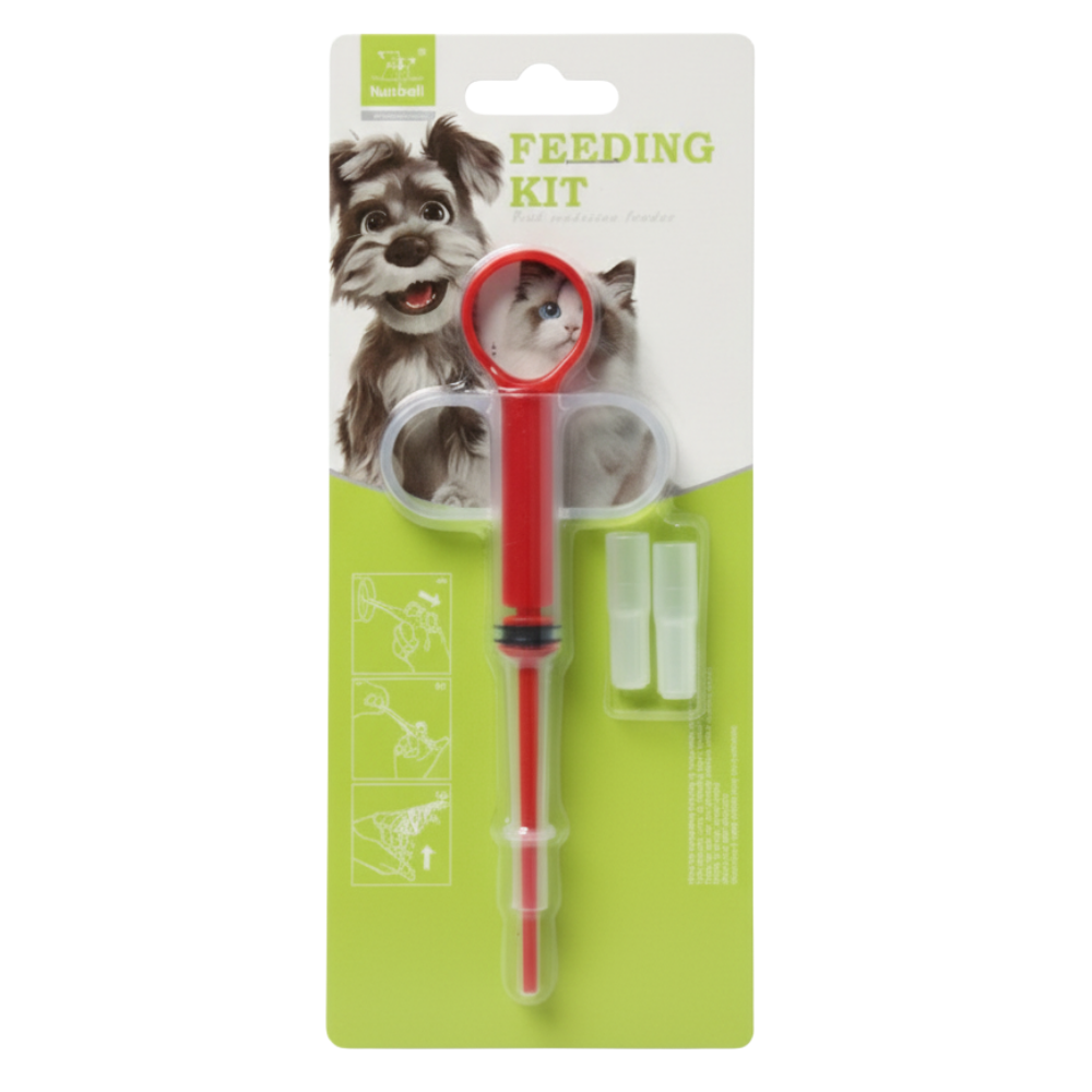Pet feeding kit with red tool on a white and green packaging background