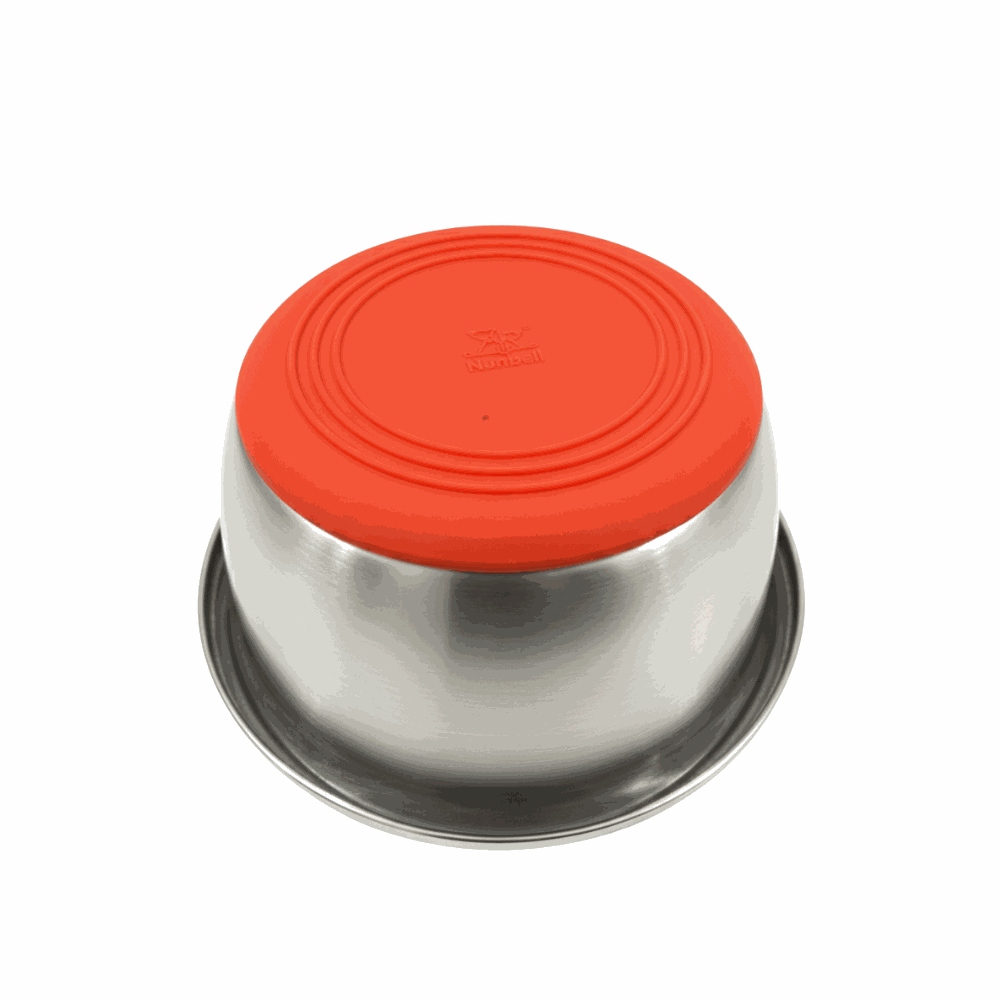 Stainless steel container with an orange lid on a white background