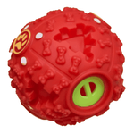 Red textured dog toy with a green center on a white background