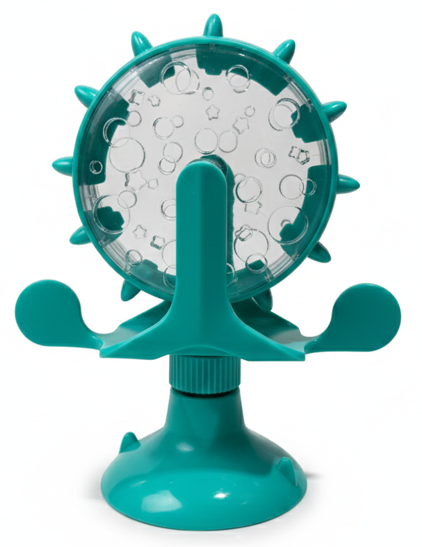 Turquoise bubble machine with clear bubble chamber on a white background