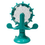 Turquoise bubble machine with clear bubble chamber on a white background