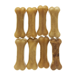 Set of bone-shaped dog treats on a white background