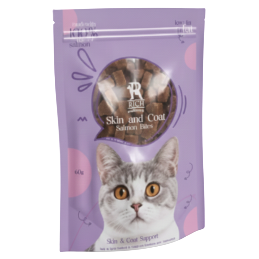 Purple package of cat treats with a cat's face on the label