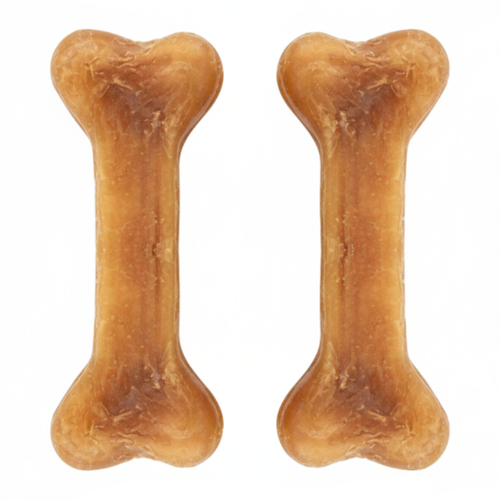 Two dog bone treats on a white background