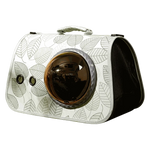 Pet carrier with leaf pattern on a white background