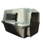 Pet carrier with beige top and black bottom on a white background