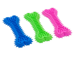 Three colorful dog toys shaped like bones on a white background