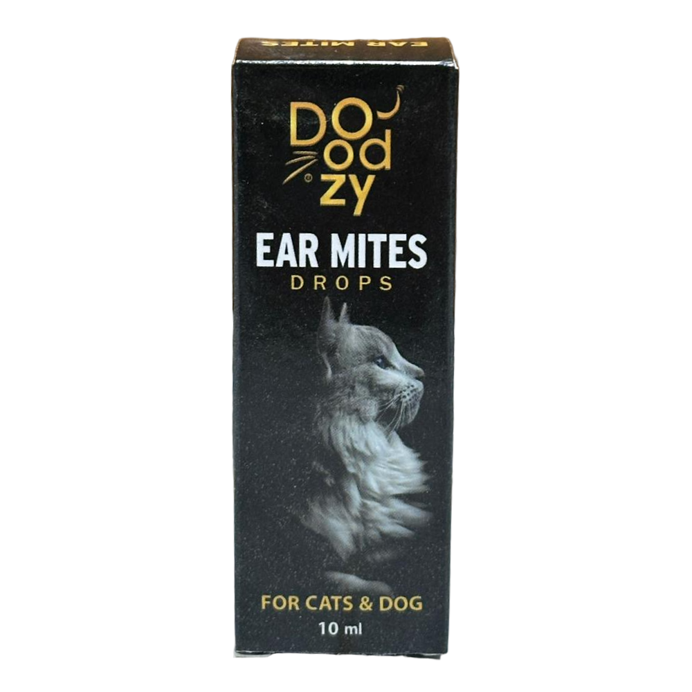 Box of Doozy Ear Mites Drops for cats and dogs on a wooden surface.