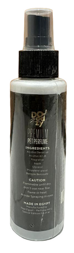 Spray bottle with black and white label on a tiled floor with wooden wall background