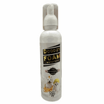 Doozy Foam bottle on a tiled floor with wooden wall background
