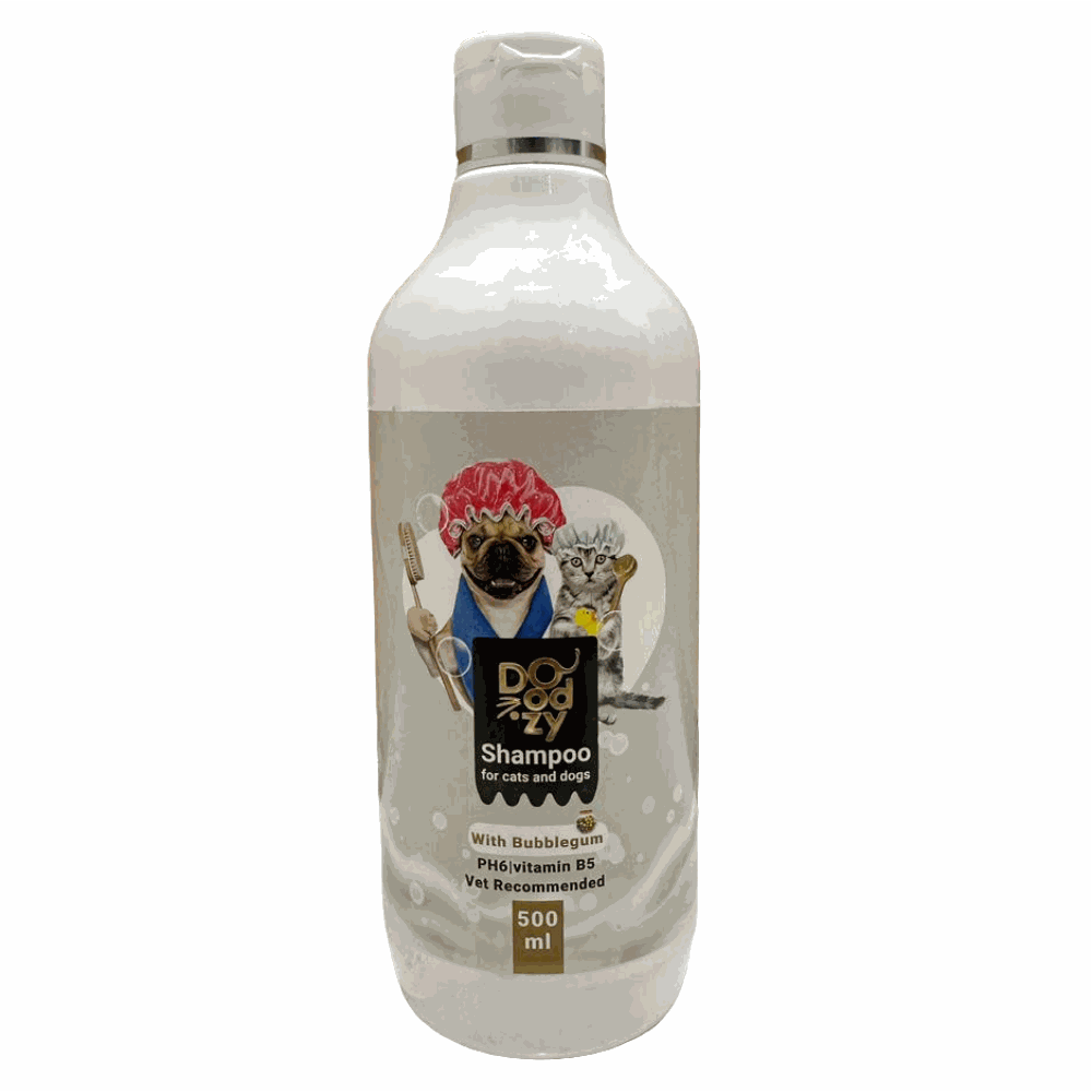 Dog shampoo bottle with a label featuring cartoon dogs on a wooden surface.