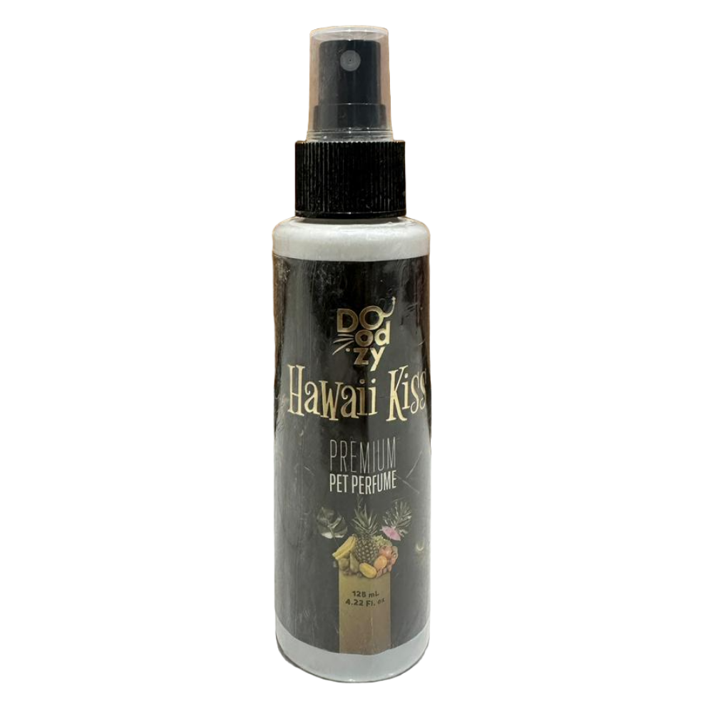 Bottle of Doggy's Hawaiian Kiss Premium Pet Perfume on a tiled floor with wooden panel background