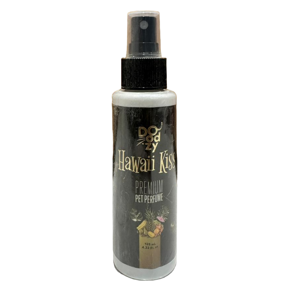 Bottle of Doggy's Hawaiian Kiss Premium Pet Perfume on a tiled floor with wooden panel background