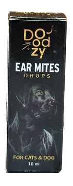 Box of Doozy ear mites drops for cats and dogs on a wooden surface.