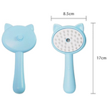 Blue pet grooming brush with cat ears, shown with measurements on a white background.