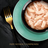 Bowl of pasta with a gold fork on a black surface, featuring the text 'Taste Without Compromise'.