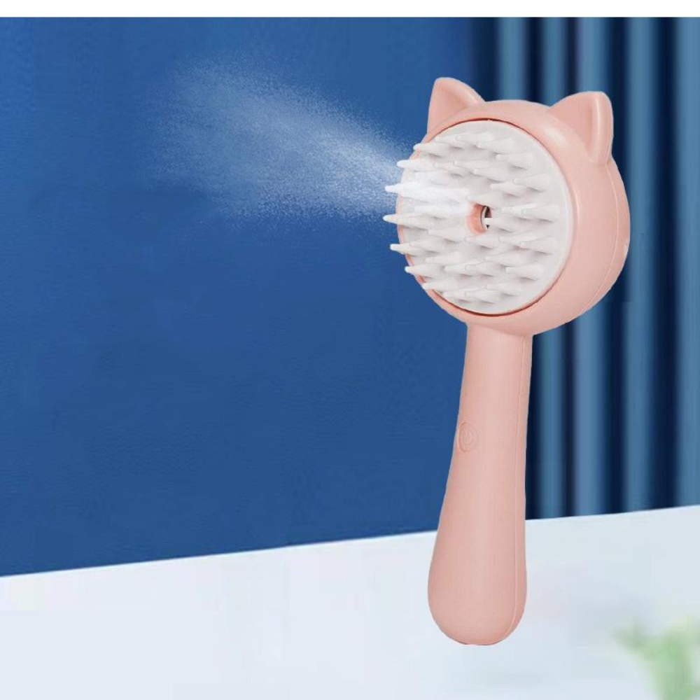 Pink handheld shower brush with cat ears spraying water against a blue curtain background
