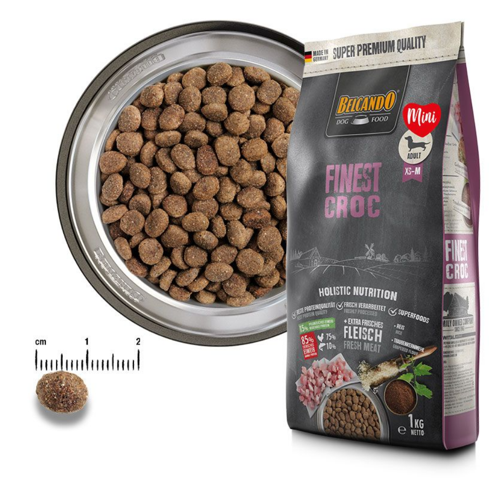 Belcando dog food packaging with a bowl of kibble and a single kibble next to a ruler for scale.