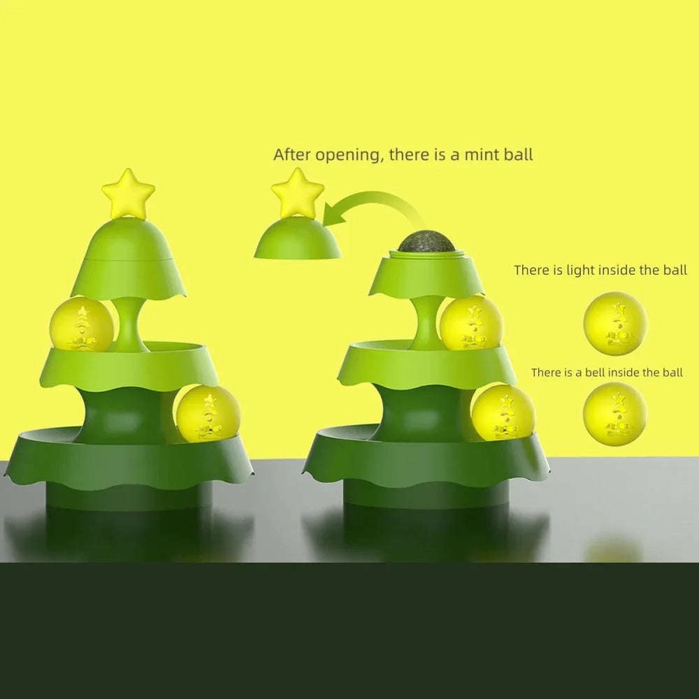 Green toy structure with yellow balls on a yellow background