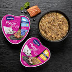 Vitakraft Poésie Delice Plus cat food packaging with a bowl of wet cat food on a dark surface.
