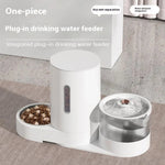 One-piece plug-in drinking water feeder with dry-wet separation and water and grain integration on a neutral background.
