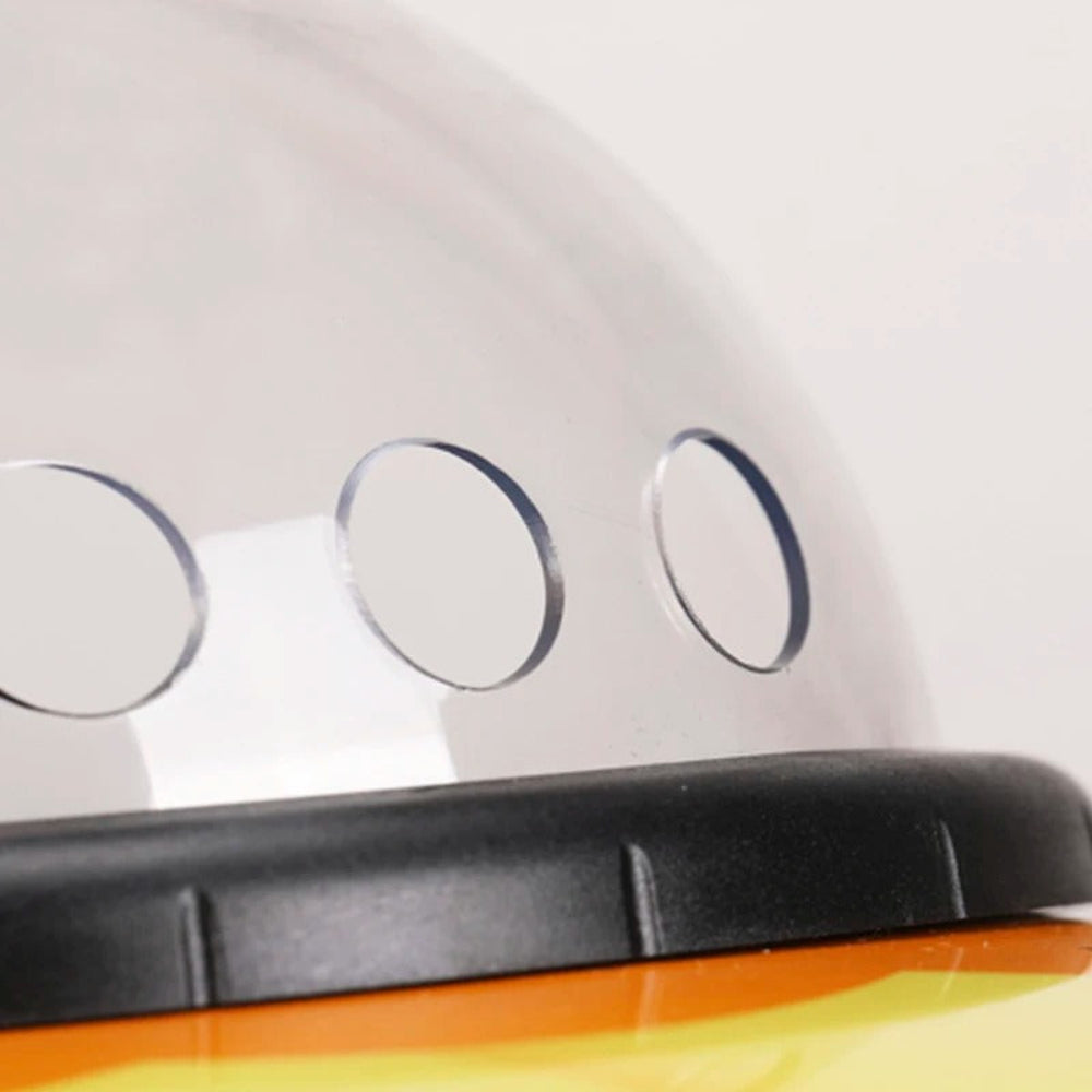 Close-up of a car's side mirror with a white background