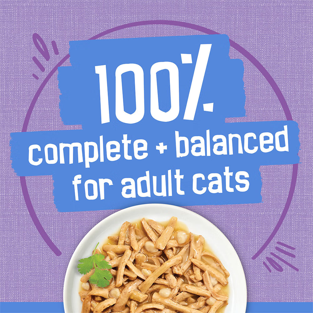 Cat food on a white plate with a purple background and text about complete and balanced diet for adult cats.
